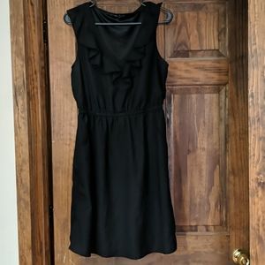Black sleeveless dress with pockets